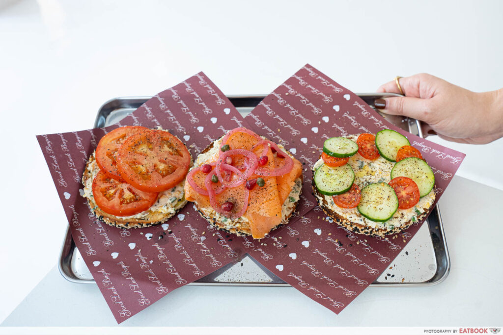 Savoury open-face bagel with sesame crust at Good Luck Bagels
