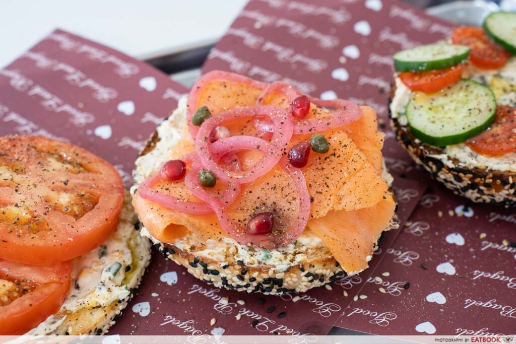 Smoked salmon bagel with pickled onions and pomegranate at Good Luck Bagels