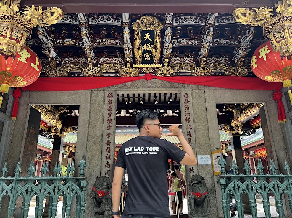 Historical image of Telok Ayer waterfront and temple visitors